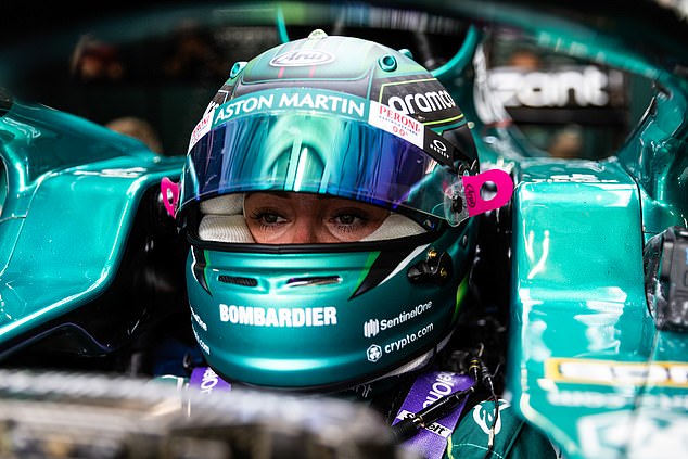 Hawkins sits in the cockpit of Aston Martin at the Hungaroring before testing the 2021 car