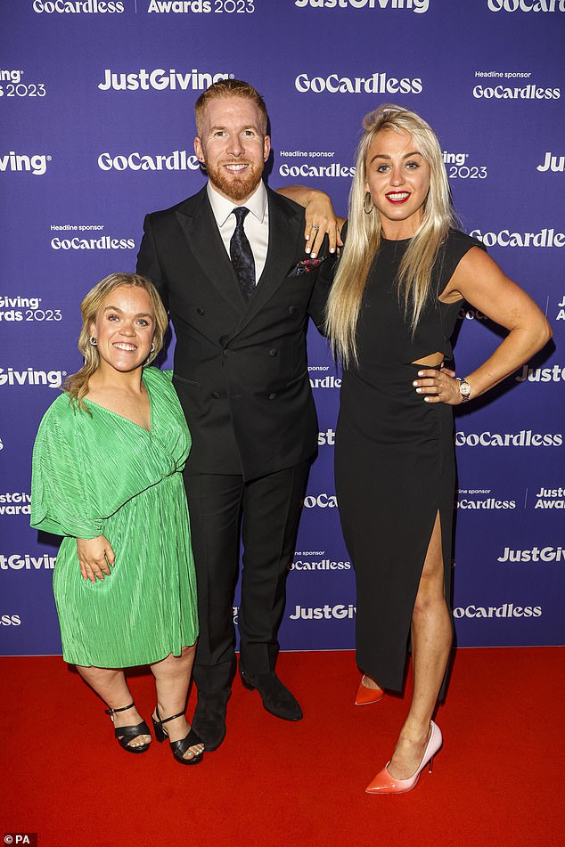 There they are!  During the event, Ellie posed for photos with Strictly pro Neil Jones (centre) and snowboarder Aimee Fuller