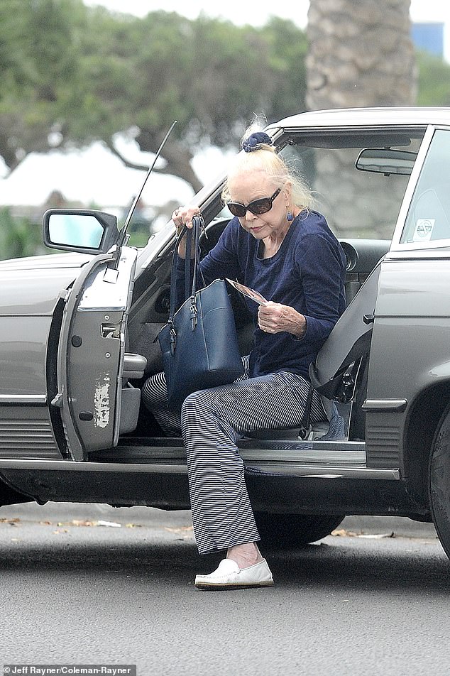 Michelle appeared to be in good health and drove herself to and from lunch in a vintage Mercedes