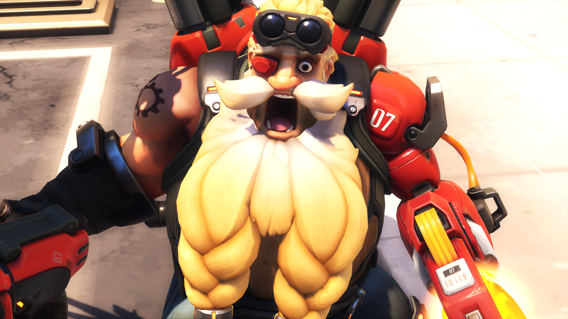 Little bearded Torbjorn from Overwatch stares open-mouthed at the camera.