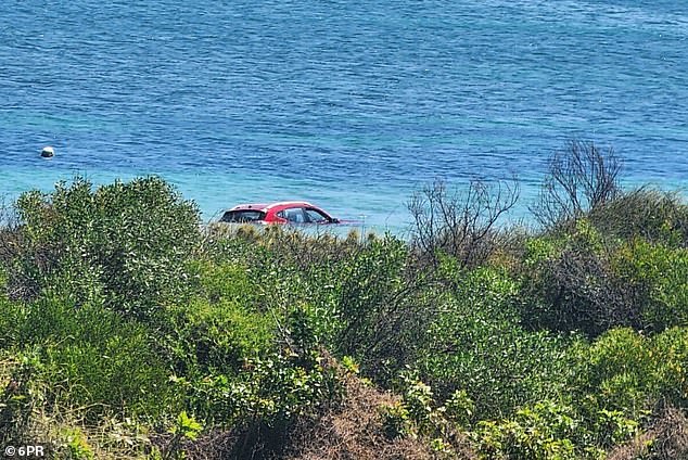 The investigation is ongoing, but police have taken into custody one man who was behaving erratically in a boat near the submerged car.