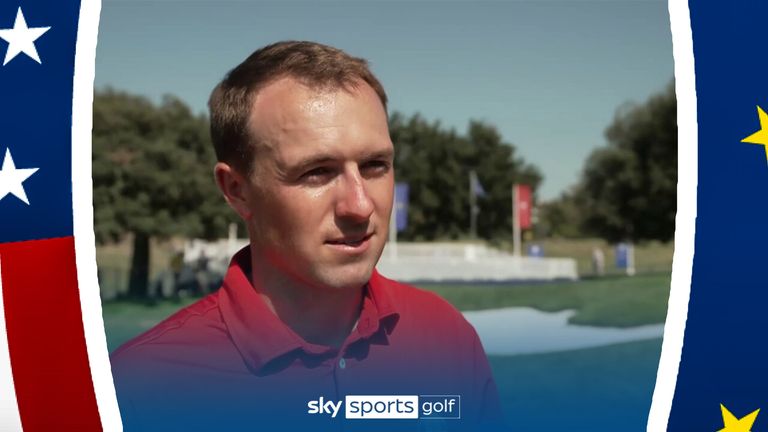 Jordan Spieth speaks with Dharmesh Sheth after practicing on the track and driving range with his friend Justin Thomas