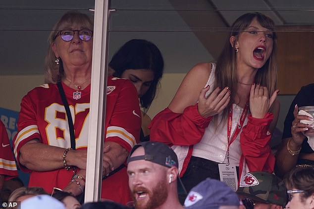 Taylor sat next to Kelce's mother and was ecstatic looking for the NFL tight end
