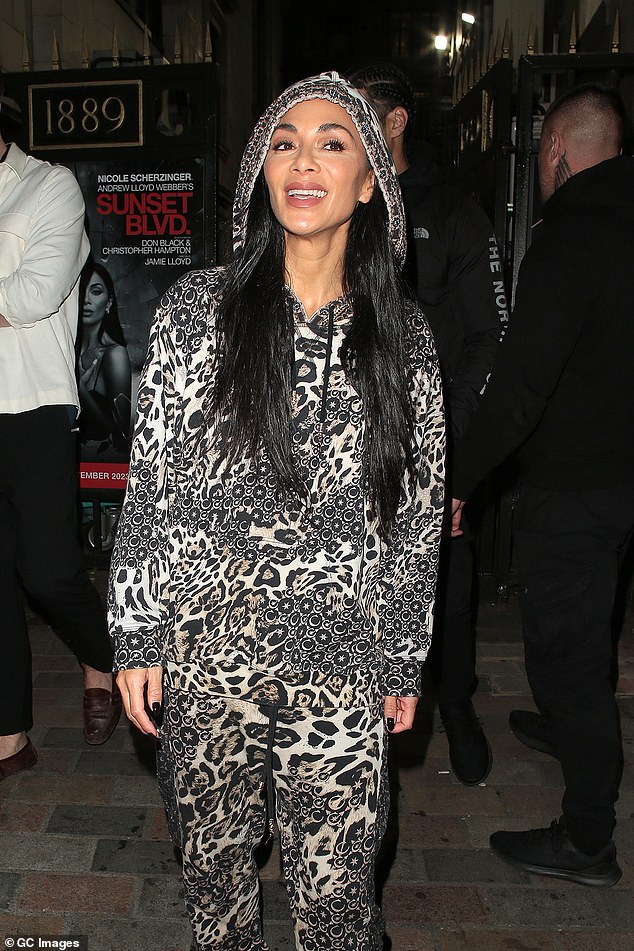 Rack!  The former Pussycat Doll, 45, opted for a statement leopard print hoodie and track pants for the ride home