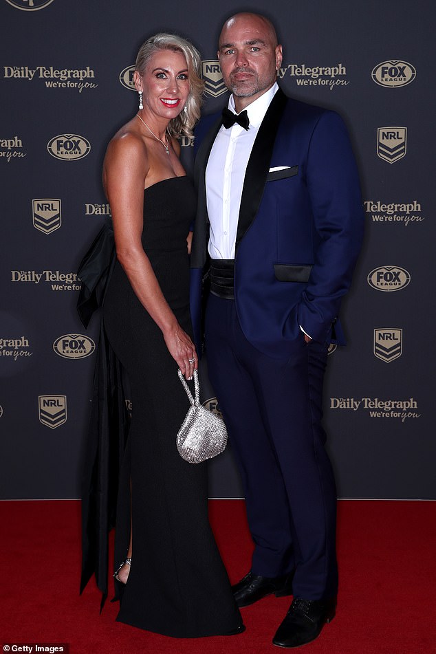 Cowboys coach Todd Payten and his wife Julie Payten (left) arrived in style, with the latter opting for a tight black dress with a bow tied around the back and a slit that just showed part of her hind leg as she walked