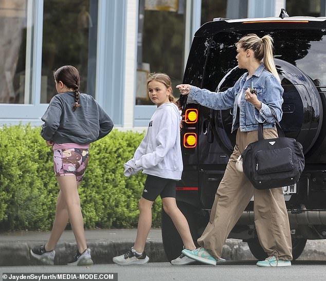 Emma is pictured with Lyon's daughters, whom he shares with his first wife, Mel