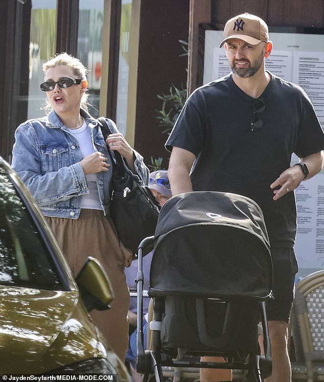 After making careful styling choices to hide her pregnancy for months, Emma was dressed casually as she stepped out with her husband and his girls.