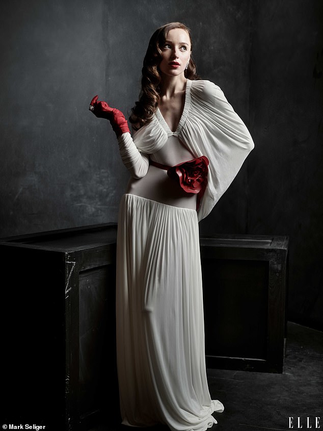 Phoebe posed during the accompanying shoot, showing off a range of vintage-inspired looks, from a semi-sheer cape dress to a sheer taffeta dress