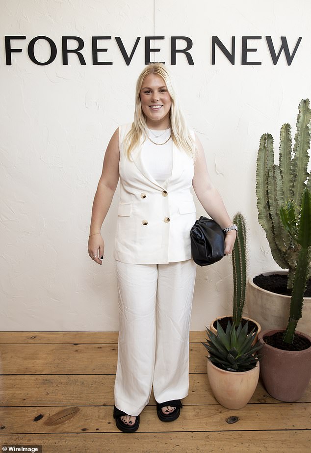 Brooke Warne, 24, (pictured) wasn't far behind with her own chic business-casual ensemble featuring a black and white color palette