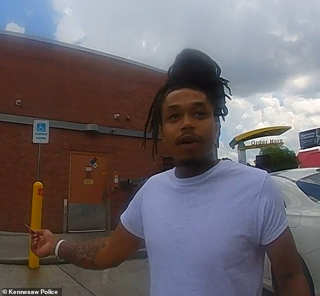 Antoine Sims, 24, was wearing an ankle monitor and was suspected of murder when he called 911 to complain about the cold fries he was served at a McDonalds in Kennesaw, Georgia