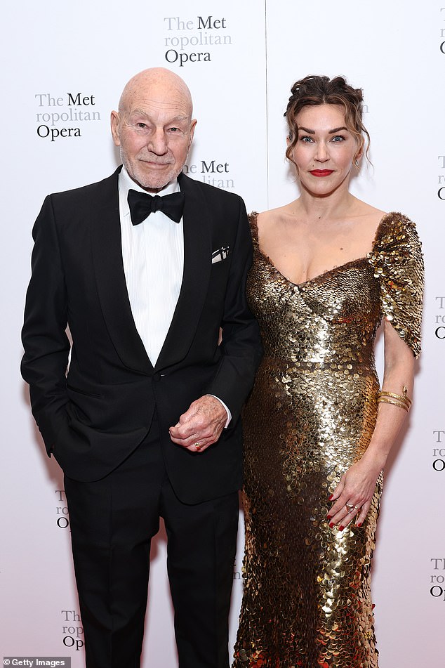 Brave: The X-Men star, 83, looked sour in a fitted black tuxedo and bow tie as he posed next to his glamorous wife