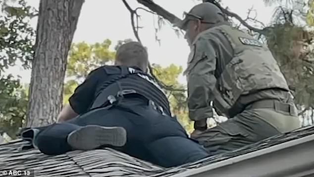 After the long standoff (SWAT and police members pictured above while outside the home), police entered the home and found the victim unconscious with a gunshot wound.  Shortly afterwards, she was confirmed dead by paramedics on the scene