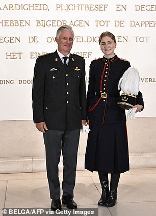 King Philippe, 60, who spent three years at the esteemed institution between 1978 and 1981, posed for photos with his daughter