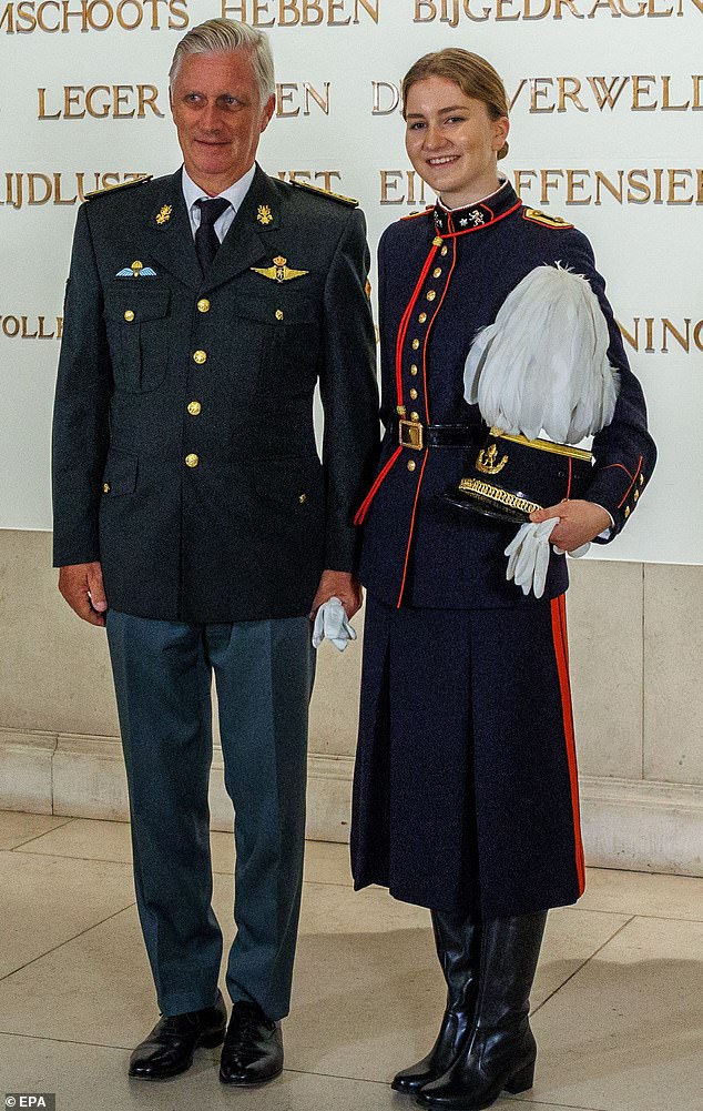 She then joined her family to pose for photos, where she stood proudly beaming next to her father, the king.