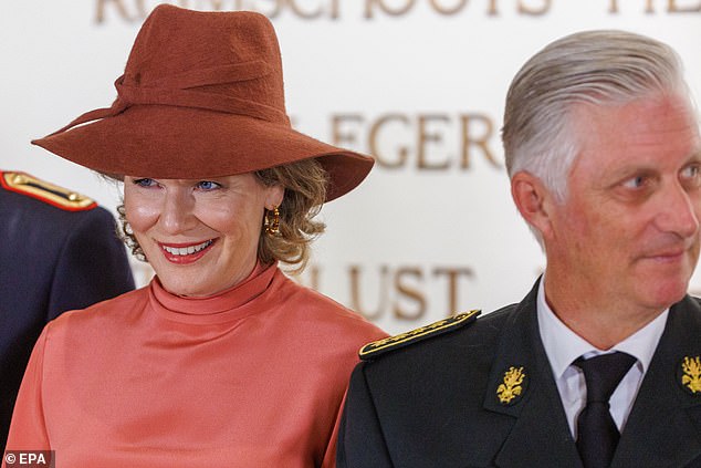 Meanwhile, she paired the dress with brown heels and a matching hat, styling her blonde hair into soft curls for the occasion