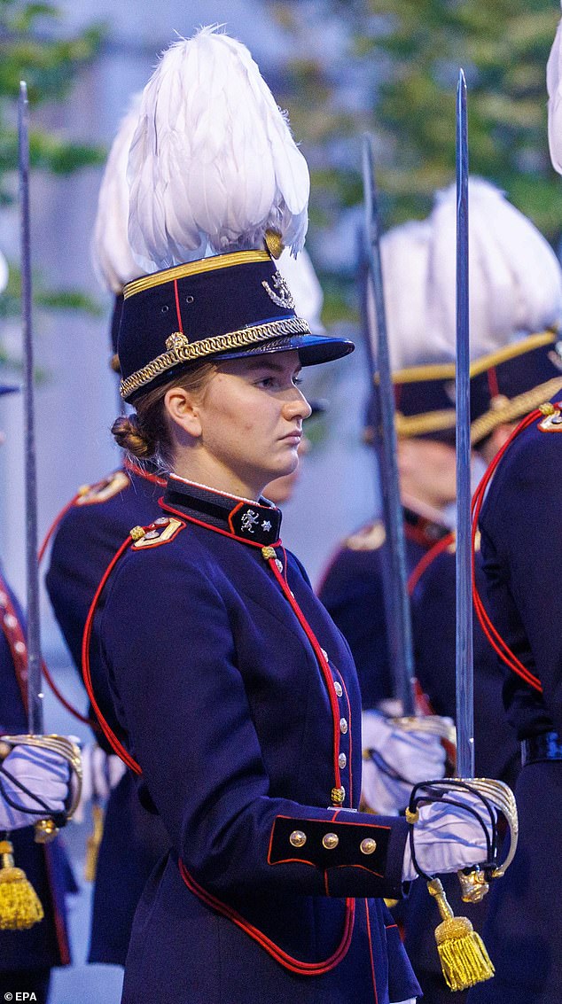 Princess Elisabeth was deep in thought when she took part in the ceremony at the military academy last night