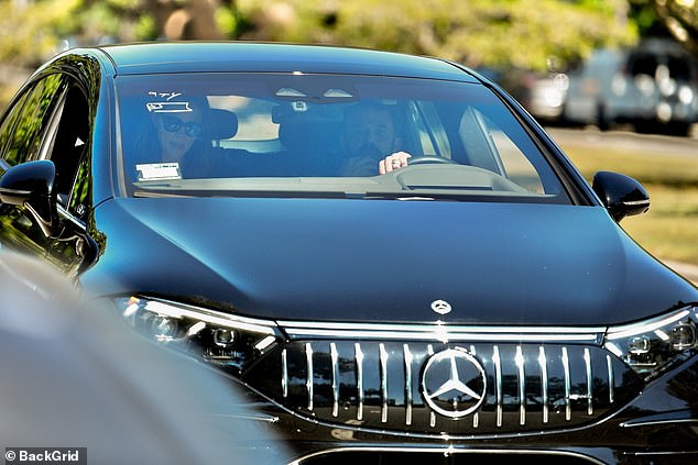 Moving forward: They met and then left in a black Mercedes-Benz luxury car