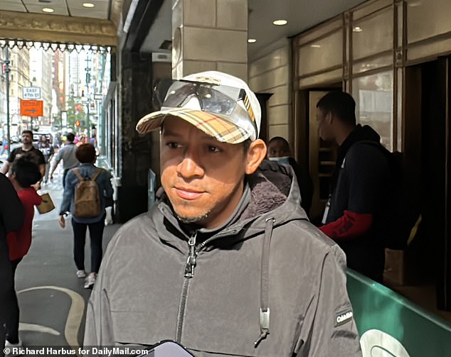 Jonathan Caro (pictured) and his partner Yorgelis Almarza, both 29, crossed the dangerous Darien Gap that connects South and Central America before reaching the city