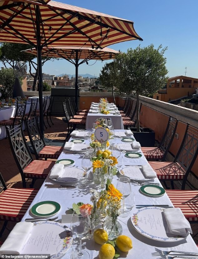 In the evening, the team went up to the roof with their partners for a rooftop dinner and posed for photos