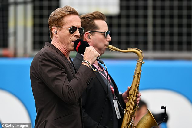 Awkward: The performance comes after Damian was mocked on social media for his toe-curling rendition of the national anthem at the British Grand Prix in July