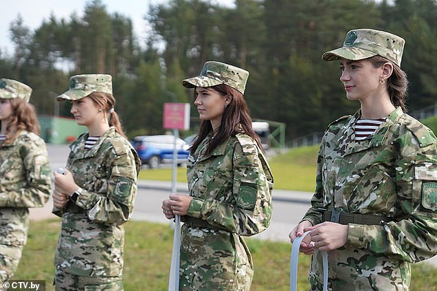 Participants proudly posed during the PR stunt aimed at inspiring young women and girls to join the military effort