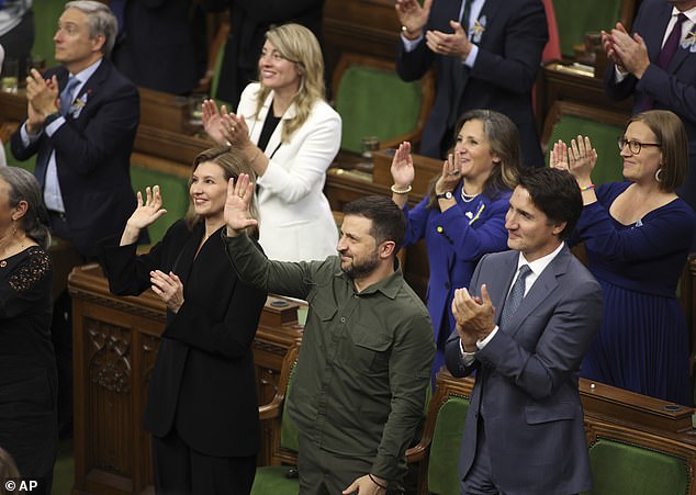 Prime Minister Justin Trudeau (photo, right) applauded the Nazi veteran