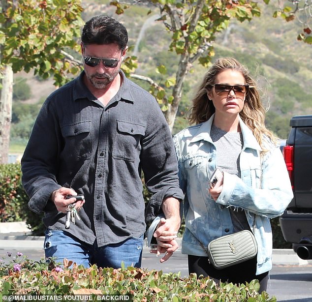 Affectionate: The Wild Things actress was also seen holding hands with him during their outing