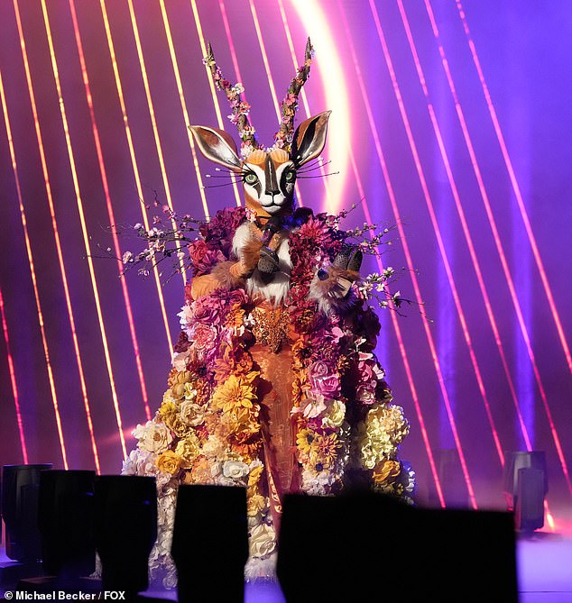 First up: Gazelle, wearing a giant animal mask decorated with colorful flowers, was the first singer to compete in the season's indoor Golden Mask Trophy