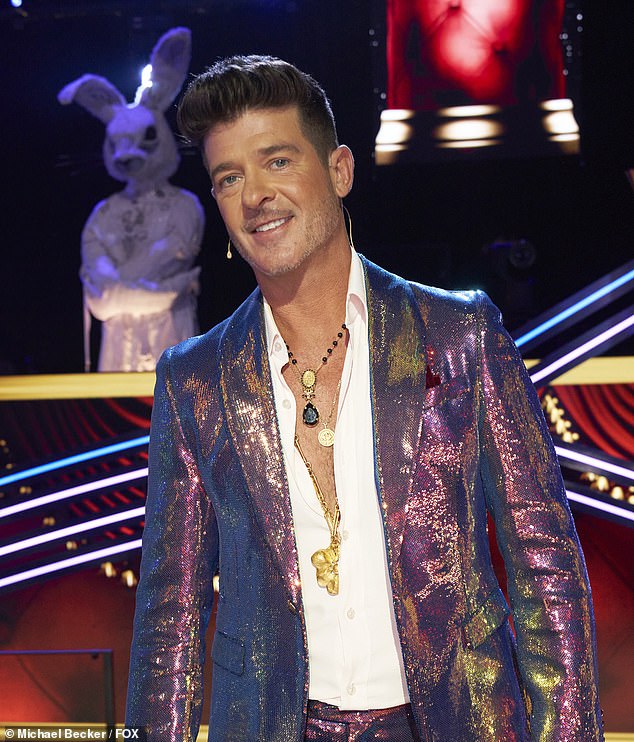 Shirt Unbuttoned: Robin Thicke had most of his shirt unbuttoned in the premiere episode