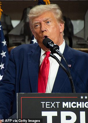 Former US President and 2024 presidential candidate Donald Trump speaks at Drake Enterprises, an auto parts manufacturer and supplier, in Clinton, Michigan