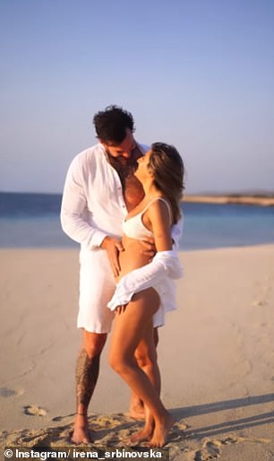 The video cut between several clips of the pair hugging and kissing on the beach as they gushed over Irena's swelling belly