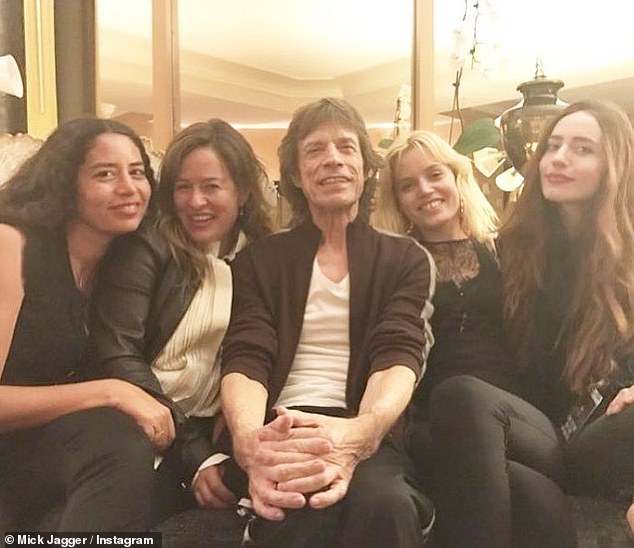 Family: Rocker Mick, 80, said his eight children 'don't need $500 million to live on' so he has apparently come up with another way to donate his fortune (photo Karis, Jade, Mick, Georgia May and Lizzy )