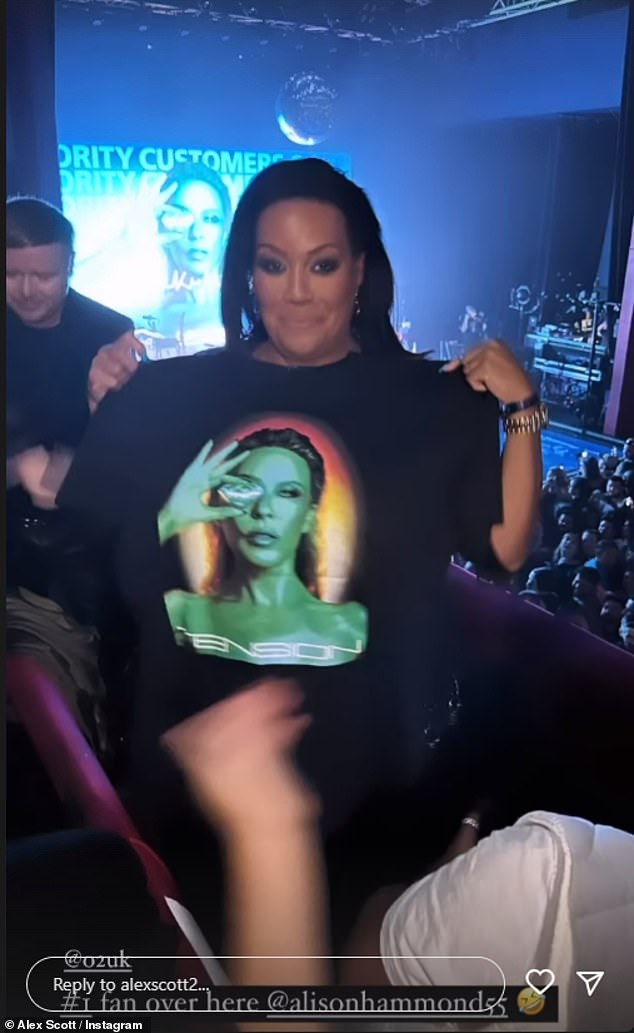 It's the Hammond!  Alex was also seen chatting to new Bake Off host Alison Hammond as she held up a Kylie Minogue Tension T-shirt to promote the star's new album.