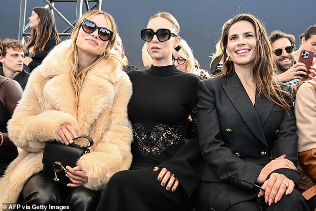 FROW: The Don't Worry, Darling director took her place in the front row alongside Vanessa Kirby and Hayley Atwell (Olivia Wilde, Vanessa Kirby and Hayley Atwell)