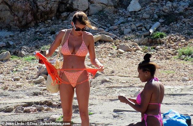 Sizzling display: The television personality, who starred in the sixth series of Love Island, and Whitney, 31, showed off their bikini bodies