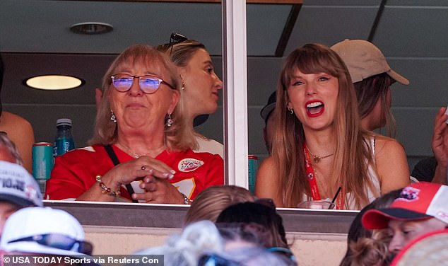 The two sat side by side in a VIP suite as they cheered on Travis together - just weeks after rumors swirled that they and the football star were dating