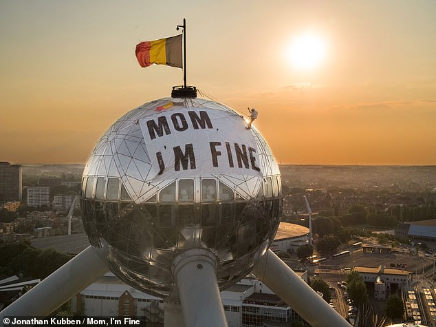 “My mom was definitely nervous about me having to travel,” Jonathan says.  'Whether I was dressed as an astronaut at the Atomium in Brussels (photo), or doing stunts on holiday, she would be scared'