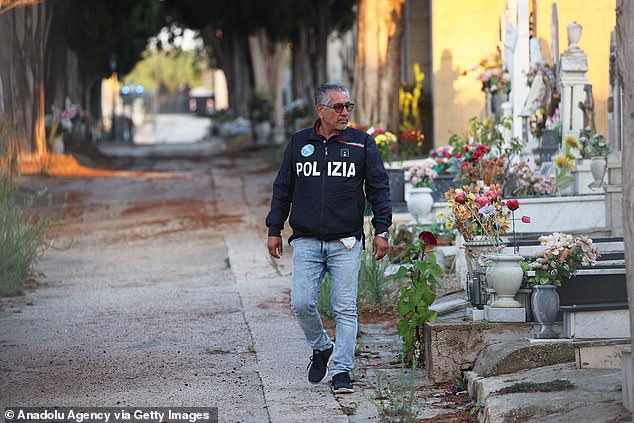 Police had closed the cemetery of Castelvetrano, south of Palermo, for his funeral and only 13 relatives were allowed inside to see his coffin being placed in the family vault.