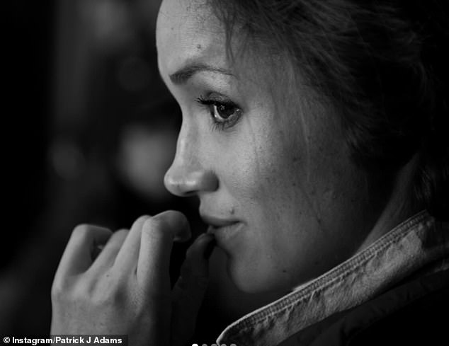 One was a black and white portrait of Meghan turning and looking at the camera with her hand to her lips (seen).  Another showed her lounging on a couch