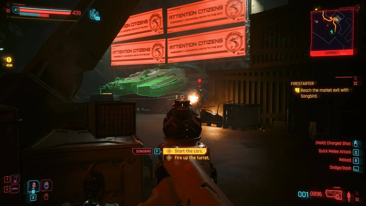 V aims a gun at a green diagram in a red room during the Firestarter mission in Cyberpunk 2077 Phantom Liberty.