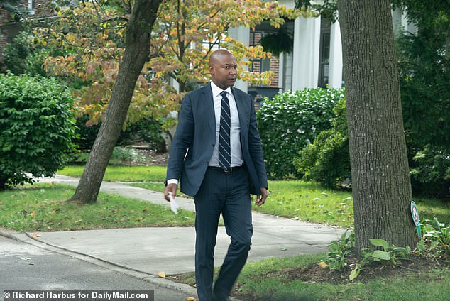 Yves Duroseau is seen outside his home in Queens after holding a press conference Thursday