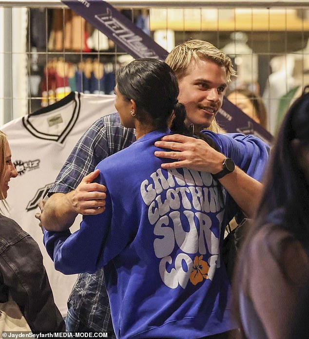 The AFL star was seen smiling and chatting with fans waiting in line to meet him at the event