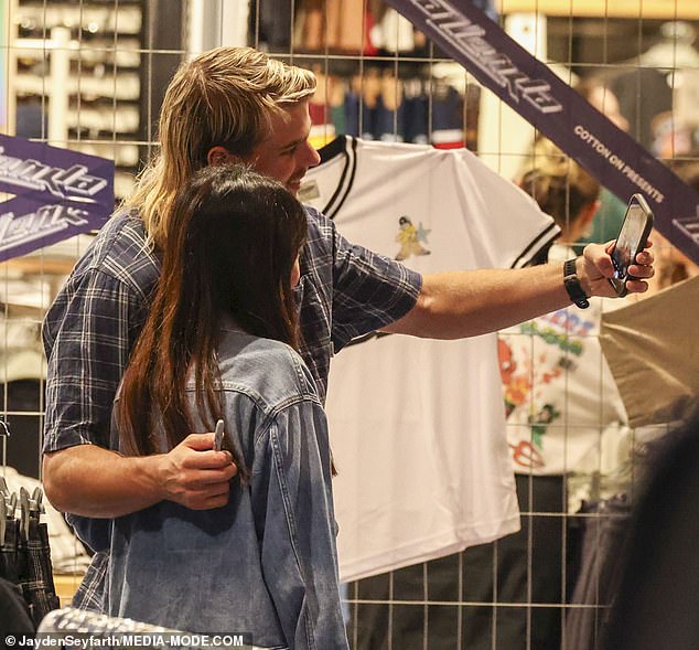 At one point, the sports star took a selfie while an excited fan waited in line