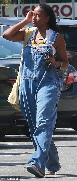 The recent graduate was photographed dropping off her car in a parking lot before walking to Stories Books & Cafe in Echo Park