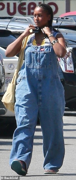 The recent graduate was photographed dropping off her car in a parking lot before walking to Stories Books & Cafe in Echo Park