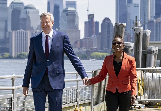 The couple, pictured here, became one of the most high-profile biracial couples in American politics when they tied the knot in 1994.