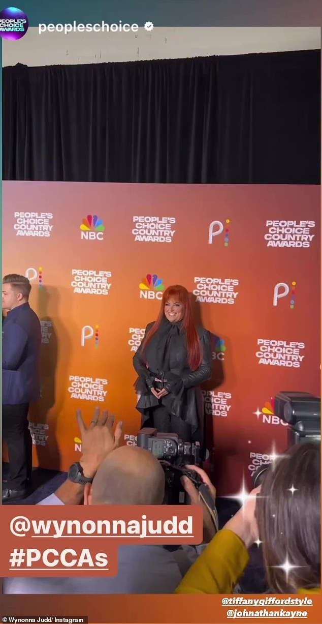 Beaming: The Ashland, Kentucky native smiled as he posed for the swarms of photographers and journalists lining the red carpet