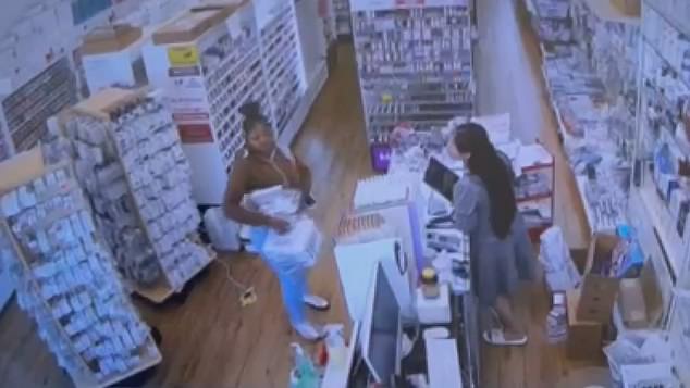 One of the alleged thieves had to return to Premier Nail Supplies just minutes after they escaped because she dropped her phone