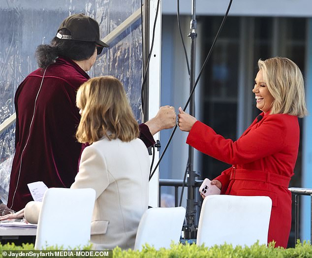 Gene greeted Sunrise newsreader Edwina Bartholomew with a 'fistshake' before appearing on the breakfast show