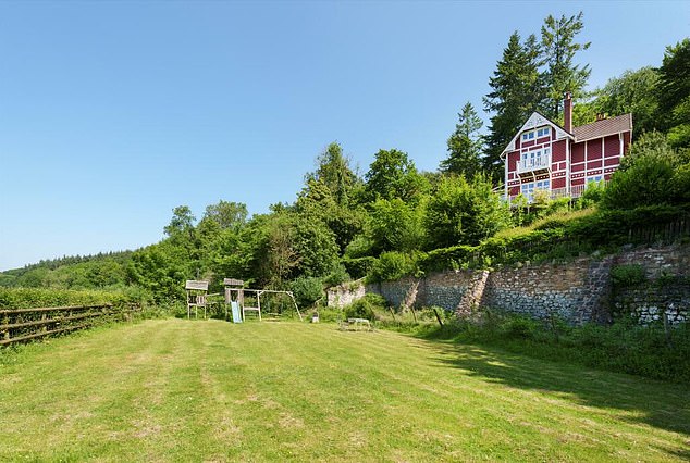 In total the land covers approximately four and a half hectares, with wooded areas and beautiful lawns